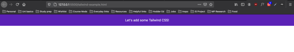 A screenshot of our HTML and Tailwind CSS in the browser, showing that our text has now turned white and is centered, against a purple background. 